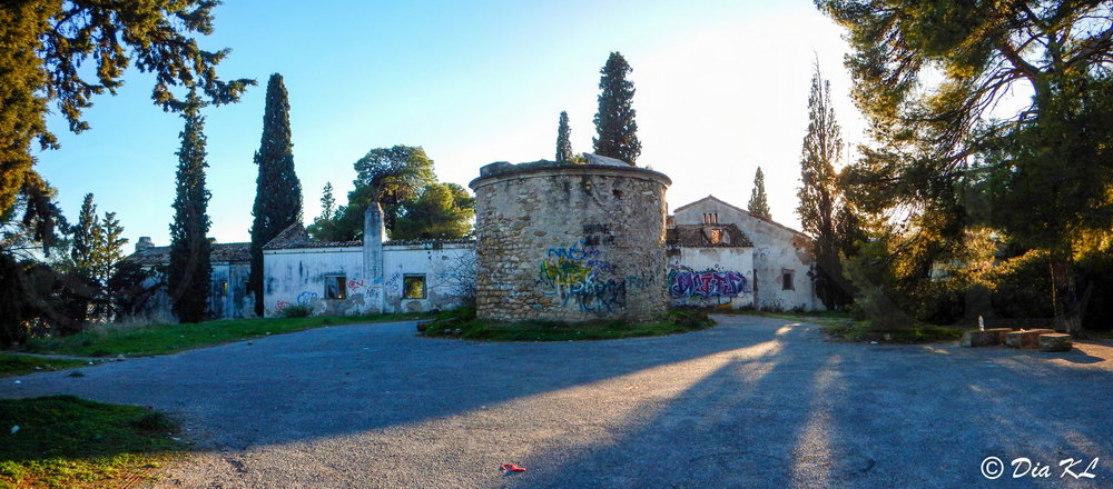 Entrance and circular tower of abandoned Villa Levidi urbex (urban exploration. Athens Greece.